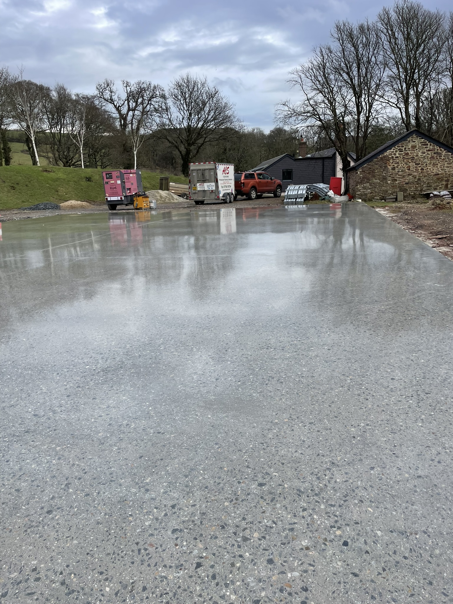 Polished concrete floor for a car port Polished concrete floor for a car port